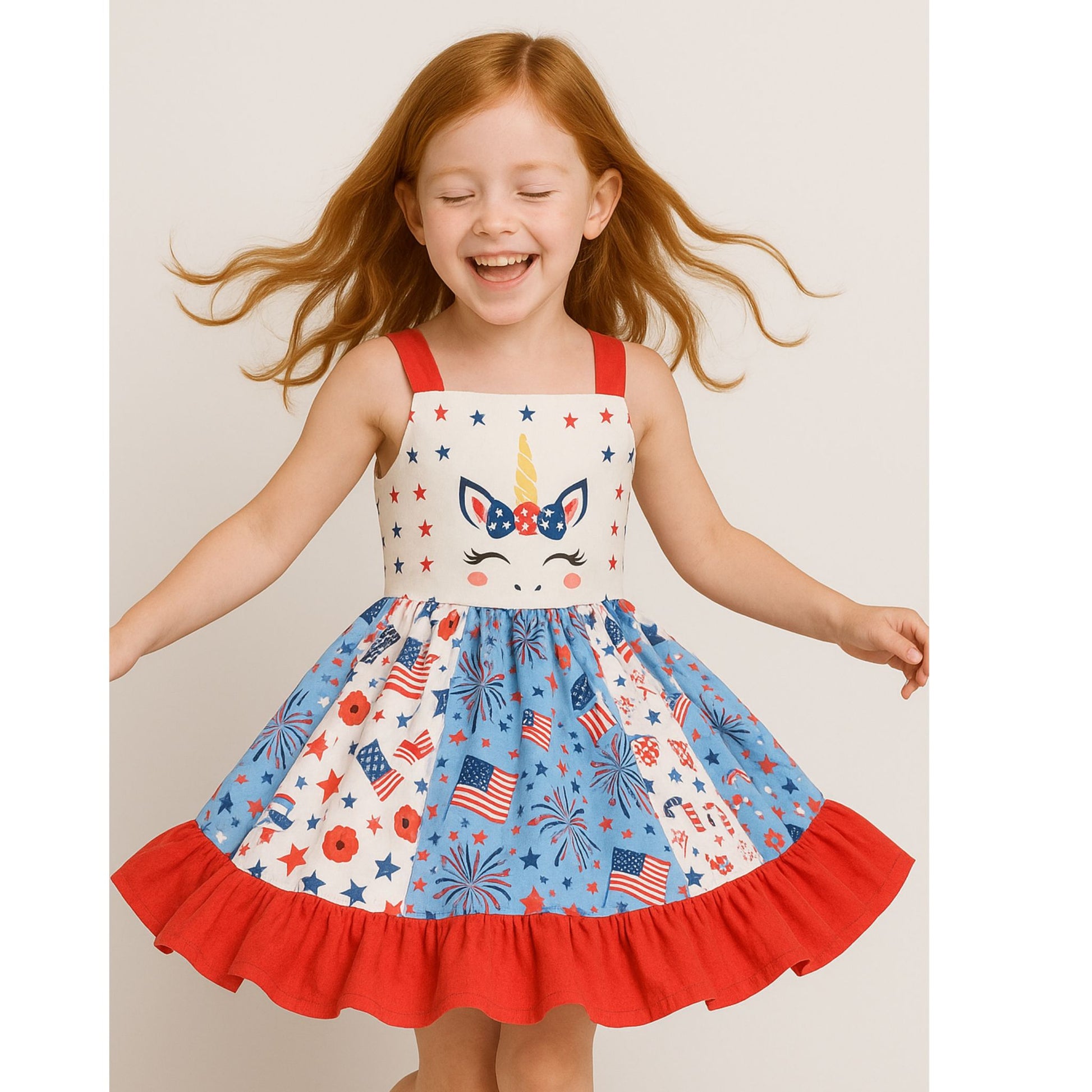 little girl twirling in patriotic unicorn dress red white and blue - Little Gift Nook
