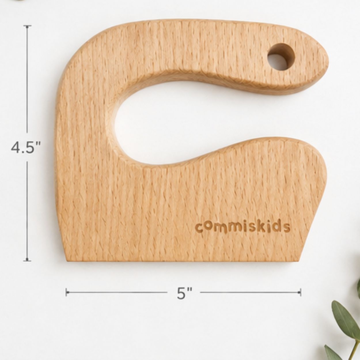 A wooden C-shaped toddler kids chopper cutting device with a hole in the top right and size dimension lines showing a height of 4.5 inches and 5" wide.