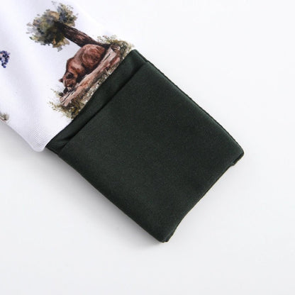 Close up of bamboo woodland animal baby sleeper fold over cuffs. 