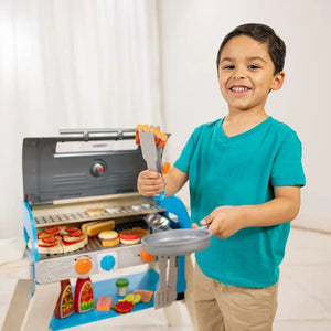 Melissa & Doug Wooden Pretend Play Grill & Pizza Oven. Child pretending to cook.