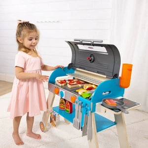 Melissa & Doug Wooden Pretend Play Grill & Pizza Oven being played with.