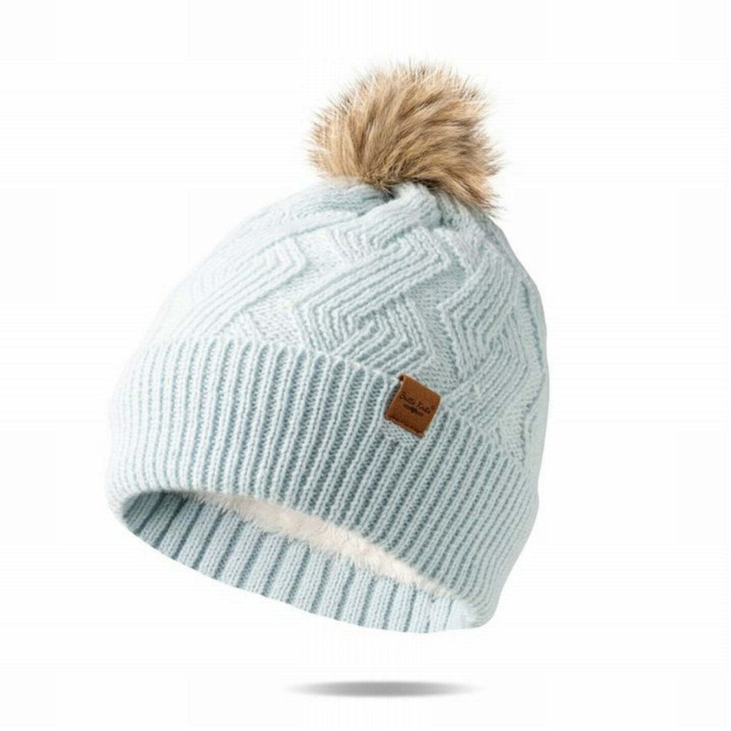 Baby Blue super soft & stretchy knit pom pom hat with tan furry pom pom at top.  Fits kids to adults. Little Gift Nook.