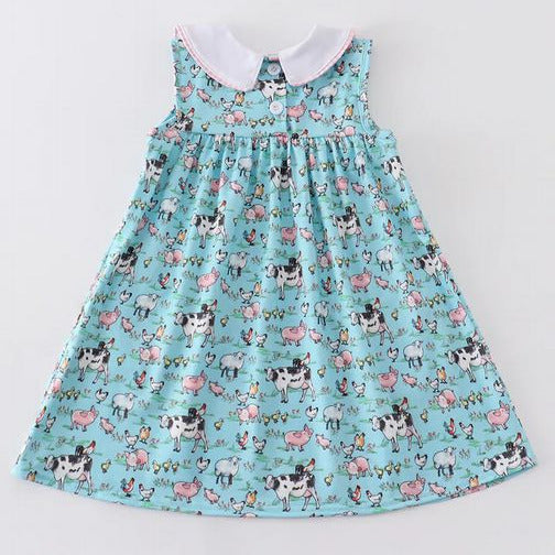 On the Farm Blue Pink Gingham Collar Pocket Dress. Back of dress. White collar sleeveless dress. 3 buttons at back. - Little Gift Nook