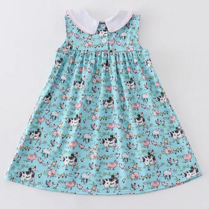 On the Farm Blue Pink Gingham Collar Pocket Dress. Back of dress. White collar sleeveless dress. 3 buttons at back. - Little Gift Nook