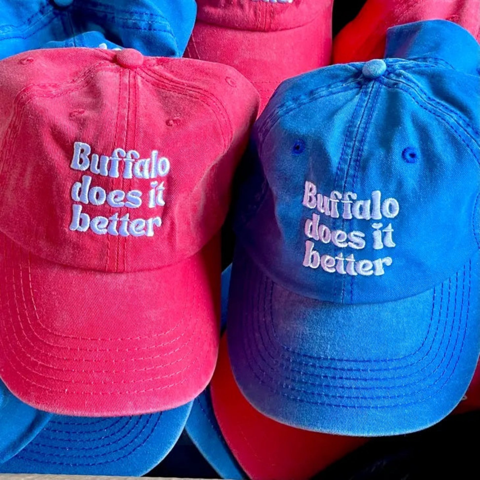 Buffalo does it Better baseball hats. Choose from royal blue or red with white lettering embroidery. Little Gift Nook.