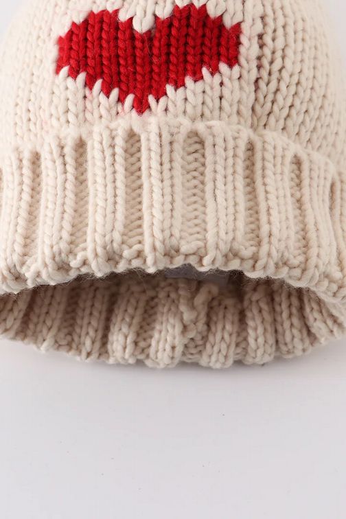 Close up of cuffed hem of Cream Knit Heart Beanie Pom Pom Baby Hat - Little Gift Nook