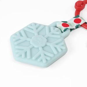 Holiday Reindeer Itzy Pal™ Plush + Teether blue snowflake teether.