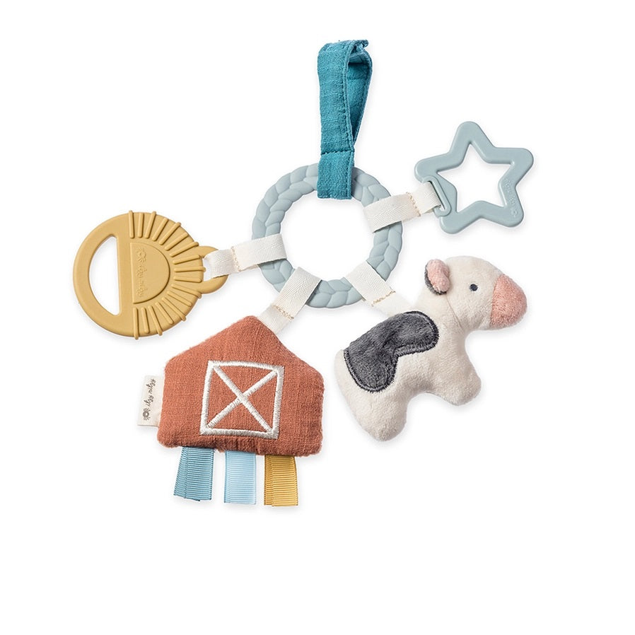 Itzy Ritzy Busy Farm Baby Gift Set. Close up of silicone ring, teether, and plush barn and cow set. - Little Gift Nook