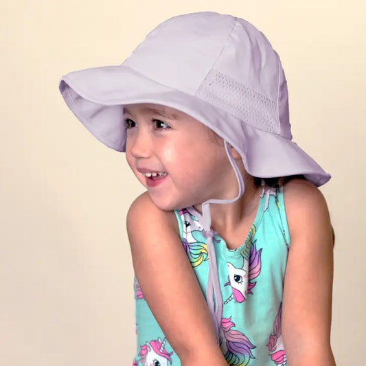 Lavender Adjustable Baby Toddler Sun Hat on little girl. Washable, adjustable, and 30+ UPF protection - Little Gift Nook