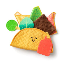 Load image into Gallery viewer, Melissa &amp; Doug Fill &amp; Spill Soft Taco Textured Baby Toy.