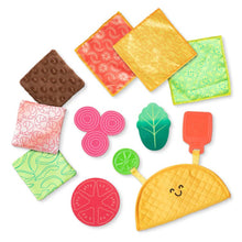 Load image into Gallery viewer, Melissa &amp; Doug Fill &amp; Spill Soft Taco Textured Baby Toy.