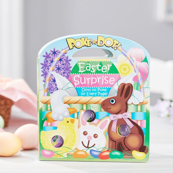 Melissa & Doug Poke a Dot Easter Surprise Book. Board Book with rounded handed at top. Has plastic bubble poppers on cover and each page that provide coordination and stimulation for babies and toddlers. - Little Gift Nook