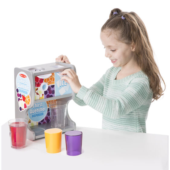 Melissa & Doug Thirst Quencher Dispenser. Put the plastic ice cubes into the one compartment at top, place plastic cup underneath, then push the leaver and watch the ice fall into the cup!  Shows little girl playing with the drink dispenser.  Little Gift Nook.