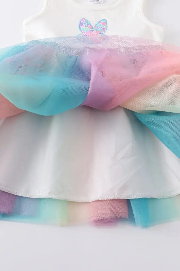 Bunny Sequin Rainbow Tutu Dress. Close up of tulle skirt on dress with white silky lining.  - Little Gift Nook