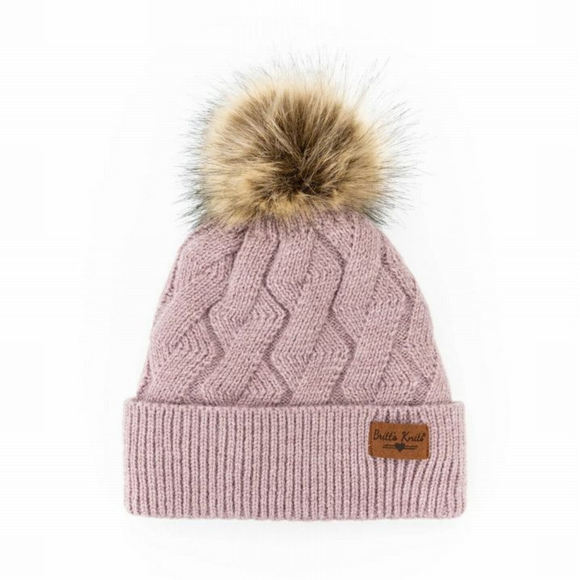 Pastel Pink super soft & stretchy knit pom pom hat with tan furry pom pom at top.  Fits kids to adults. Little Gift Nook.