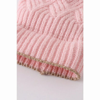 Close up of Pink cross cable knit child hat. - Little Gift Nook