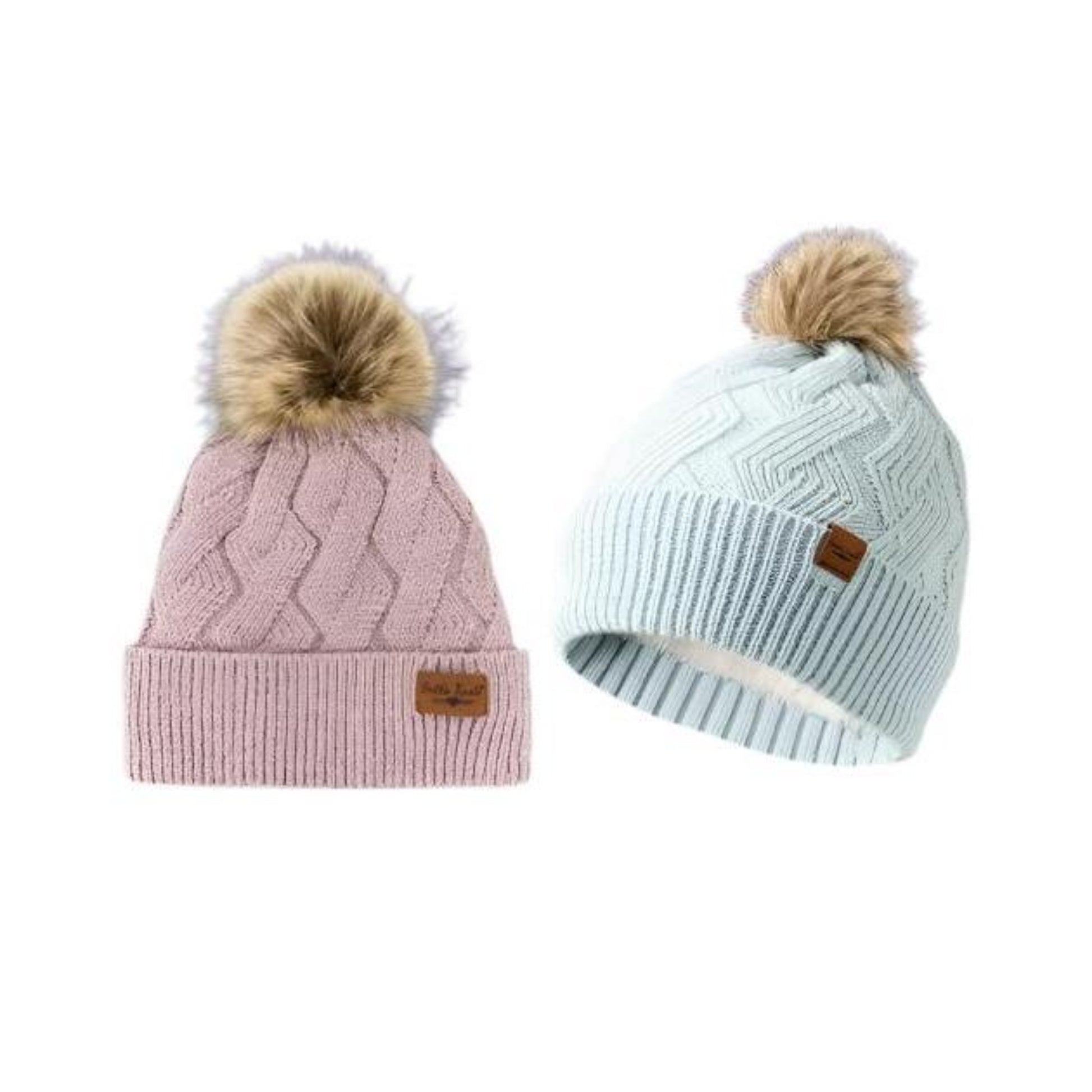 Pink or Blue Knit Pom Pom hats. Pastel pink or blue with tan furry tassel on top.  White super soft lining and very stretchy.  Little Gift Nook.