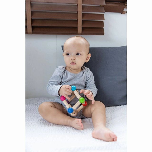 Plan Toys Square Clutching Toy for Baby. Baby holding sensory bendable wooden toy. - Little Gift Nook