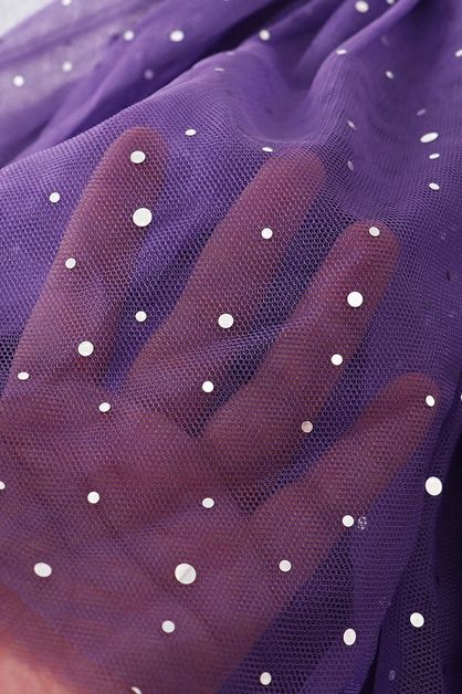 Close up of the bat purple tutu dress.
