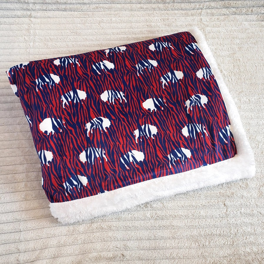 Red White Blue Zubaz Buffalo Blanket measures 30" x 40". Red with navy zebra pattern and white buffalos intertwined. - Little Gift Nook.