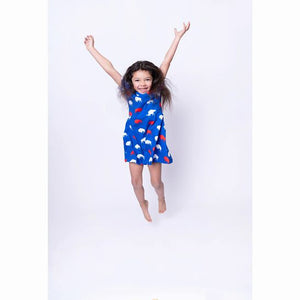 Blue Buffalo Buffalo's print silky soft twirl dress for kids. Model jumping.