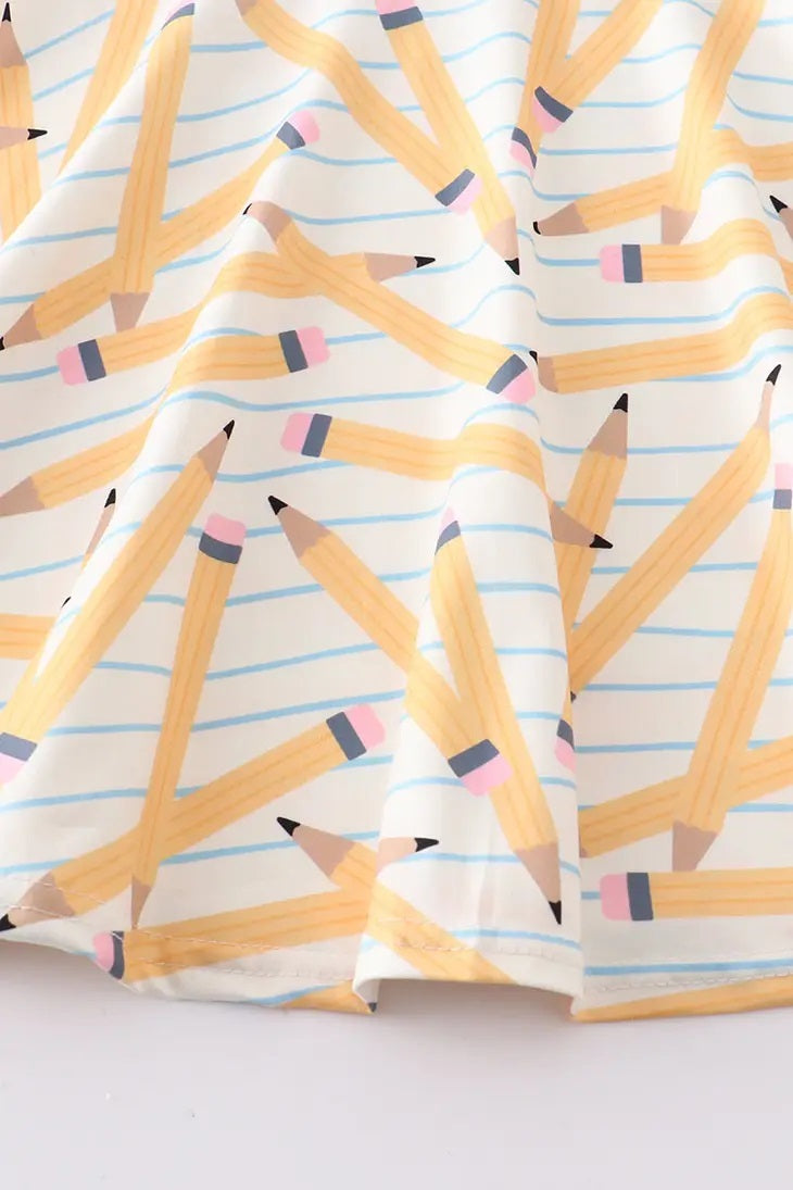 Close up of Striped Yellow Pencil Print Twirl Dress - Little Gift Nook