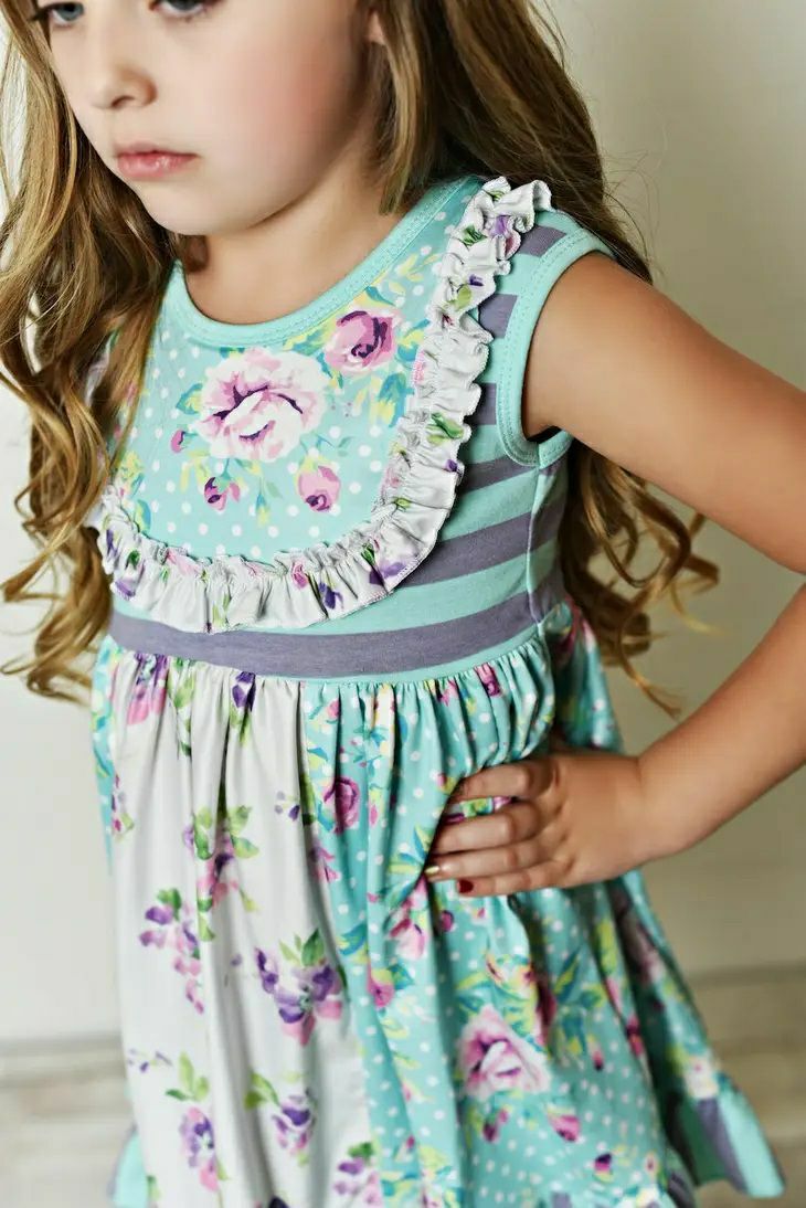 Teal Purple Floral Print Ruffle Capris Set. Close up of ruffle neckline and floral print. Sleeveless.- Little Gift Nook
