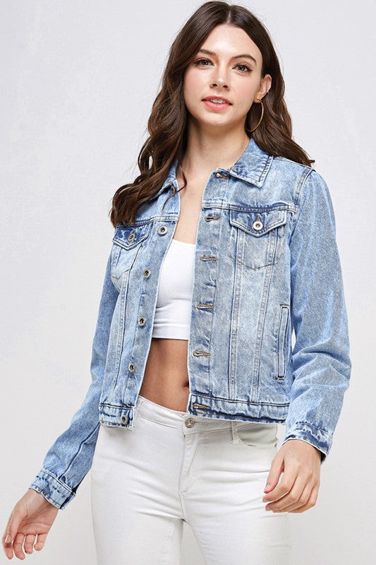 Women's Light Wash Denim Jacket. View on model.  Med wash color. Metal buttons up front and on pockets. - Little Gift Nook