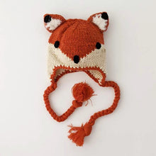 Load image into Gallery viewer, Hand knit orange cream fox baby hat with braided ties and ear flaps. 