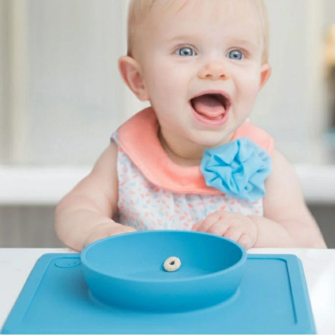 Ezpz blue mini bowl suction bowl dish baby can’t pull off table.  Less mess