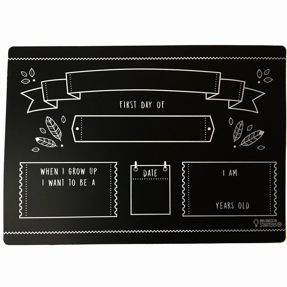 Imagination Starters black plastic wipe off First Day of School Grade write on placemat board sitting on a white background. 