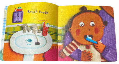 Indestructible Baby Night-Night Book inside pages brush teeth sitting on a white background.