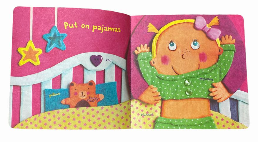 Indestructible Baby Night-Night Book inside pages put on pajamas sitting on white background.