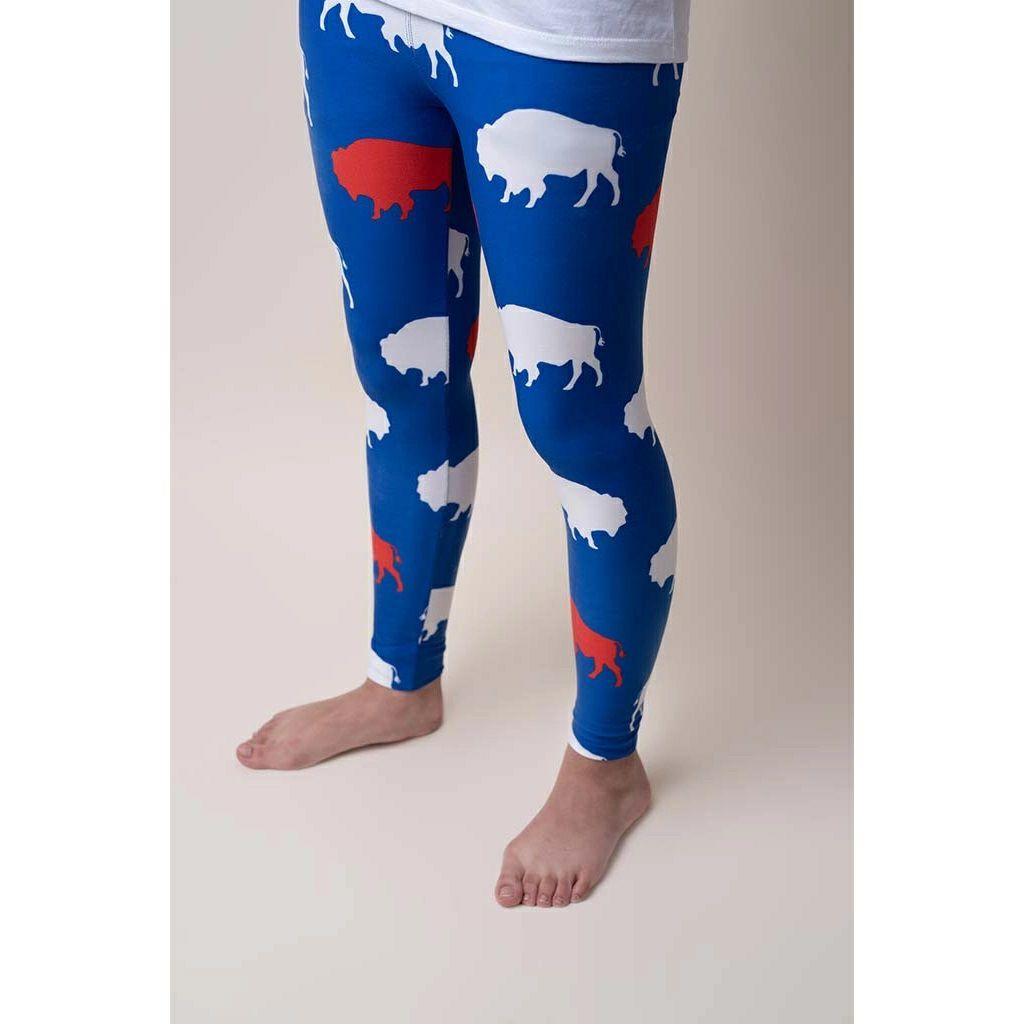 Close up of Kid's Buffalo Leggings. Royal blue leggings with red and white buffalo print. stretchy.- Little Gift Nook
