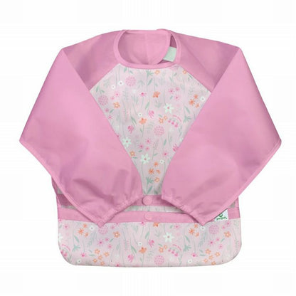Pink wildflowers print long sleeve wipe off baby bib with pocket sitting on white background. Little Gift Nook