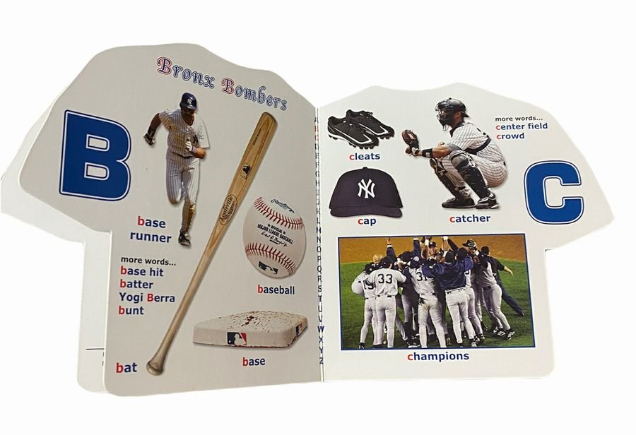 New York Yankees Alphabet Board Book open on pages B and C with bat, ball, cleats and players laying on white background.