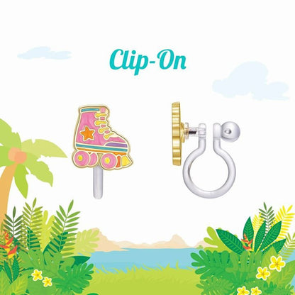Pink roller skates clip on earrings with silicone backs sitting on beach background. Little Gift Nook
