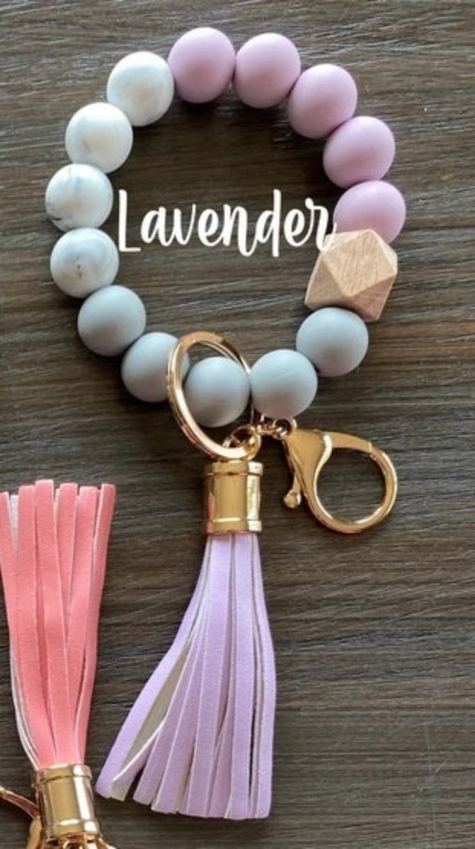 Silicone Beaded Wristlet Keychain Lavender silicone and gray beads with gold keyring, lobster clip, and lavender tassel. Little Gift Nook.