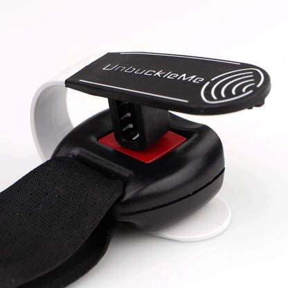 Unbuckle Me Car Seat Buckle Release in Black. seatbelt and tool helping to add enough pressure to open seat belt. - Little Gift Nook
